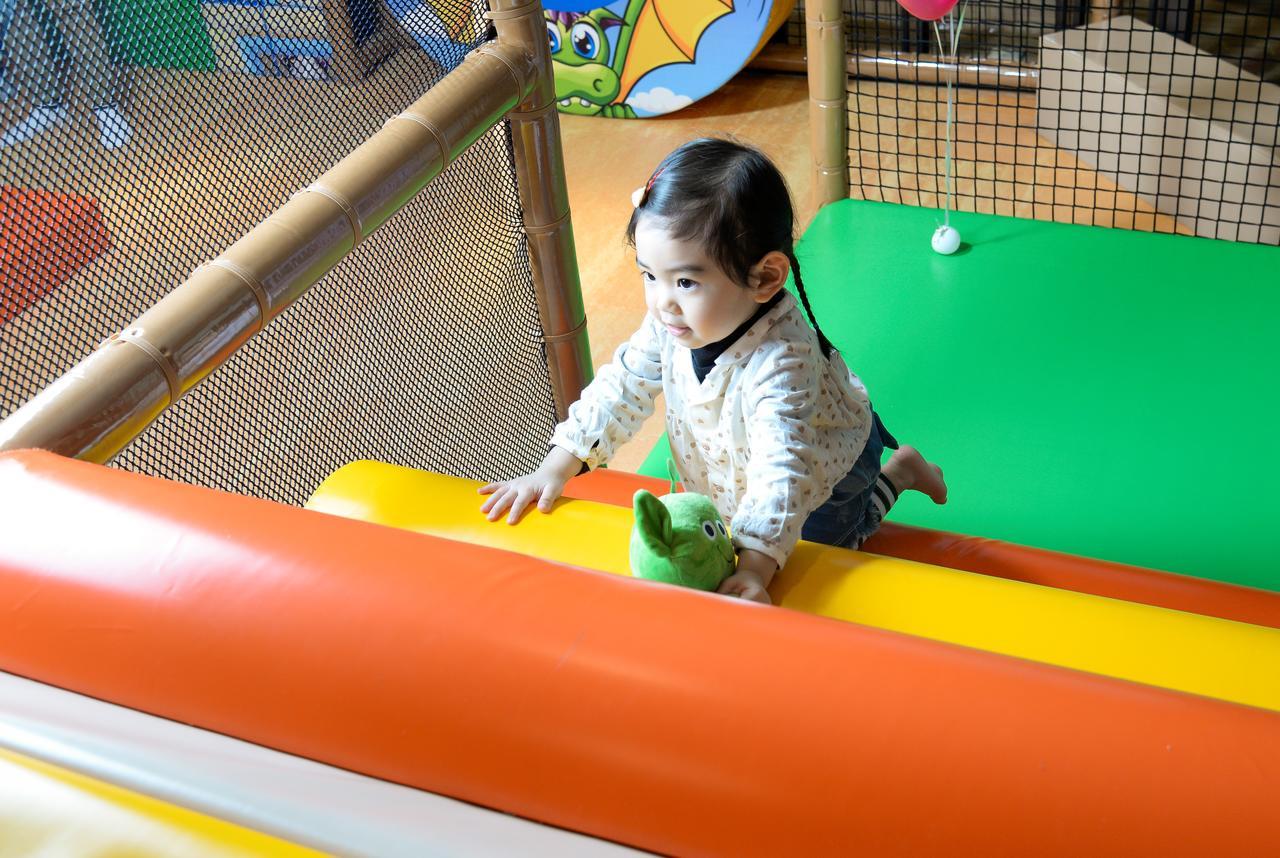 Cuncyue Hot Spring Resort Luodong Exterior photo A child playing at a playground